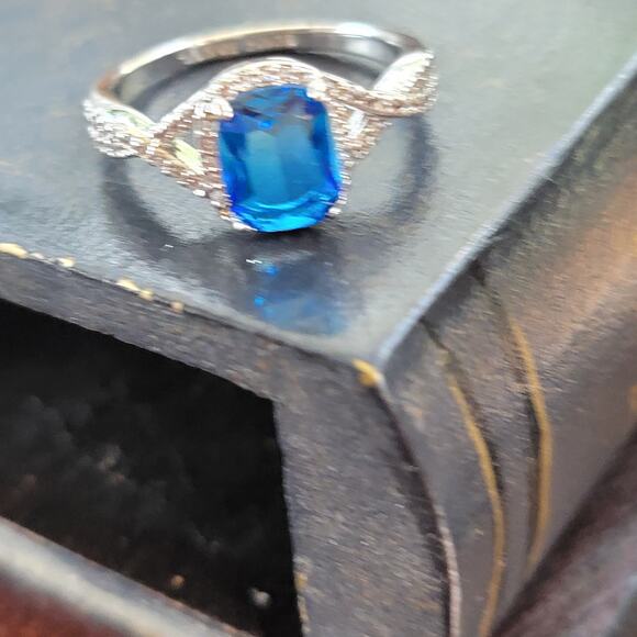 Rhodium Plated Simulated Sapphire Ring - Size 9 - Exquisite Crossover Design - Picture 2 of 12
